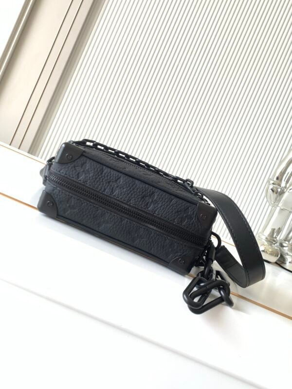 Premium packaging set. Model number M55702. Full leather embossed. Soft Trunk mini handbag.