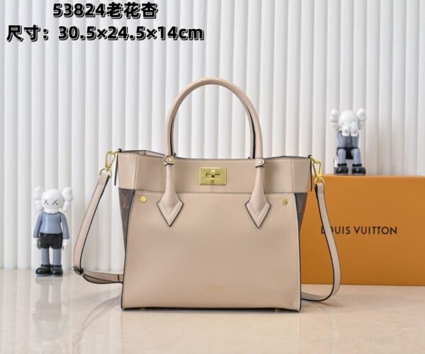 Louis Vuitton "On My Side" Handbag
